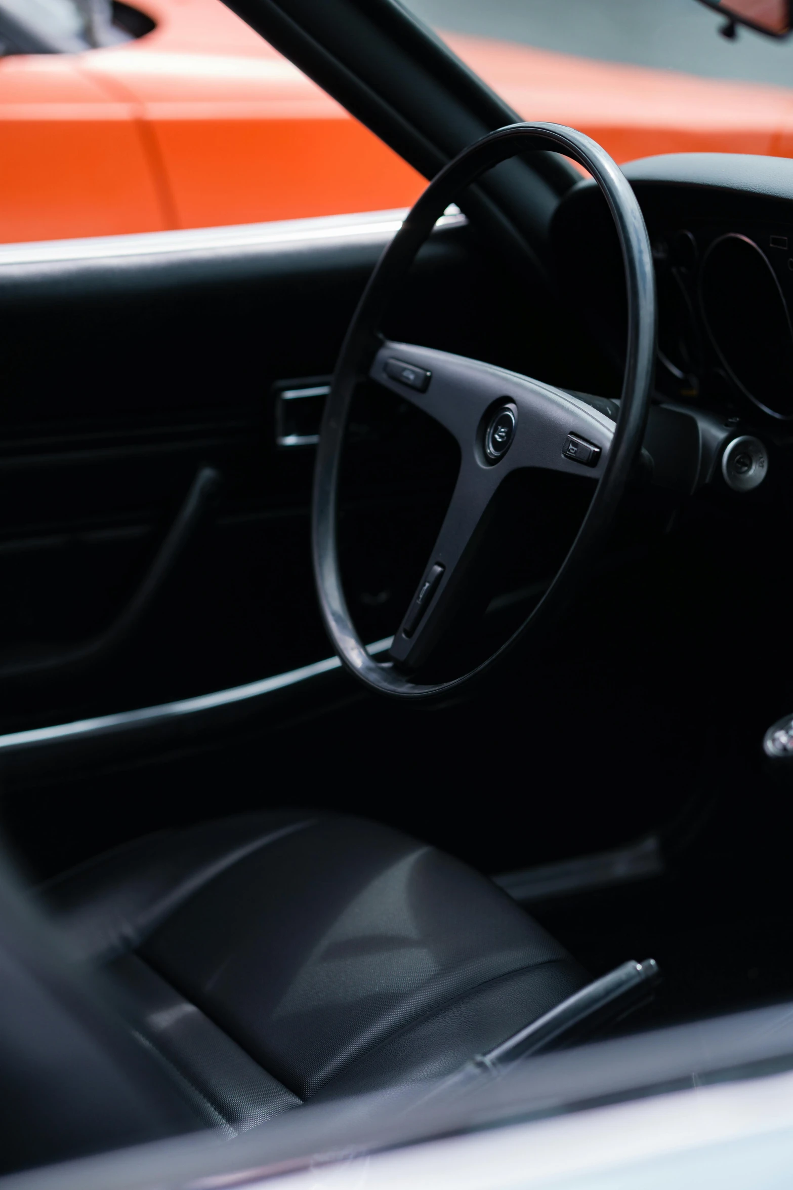 a car dashboard with leather seats in a vehicle