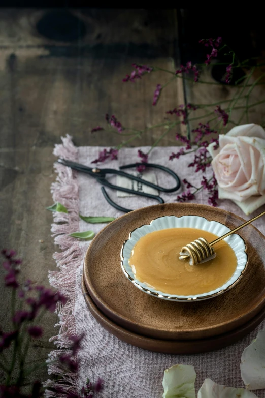 a dessert plate with peanut ding and a honey drizzle