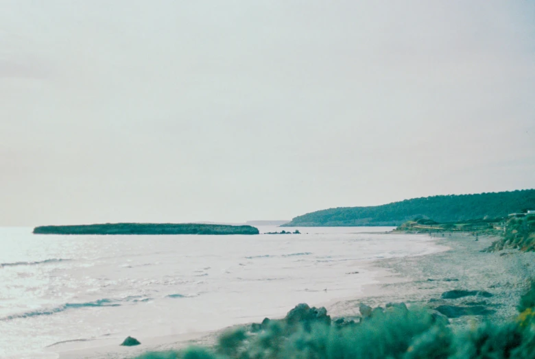 a view of some water and people out in the water