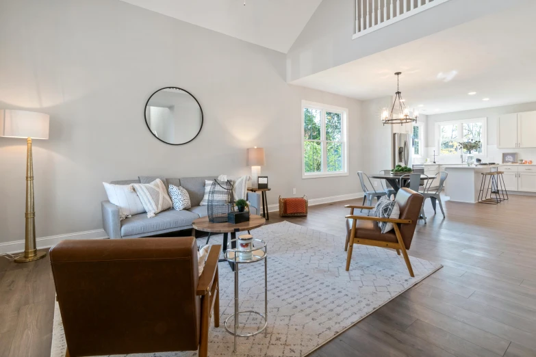 the interior of a modern living room with an open floor plan