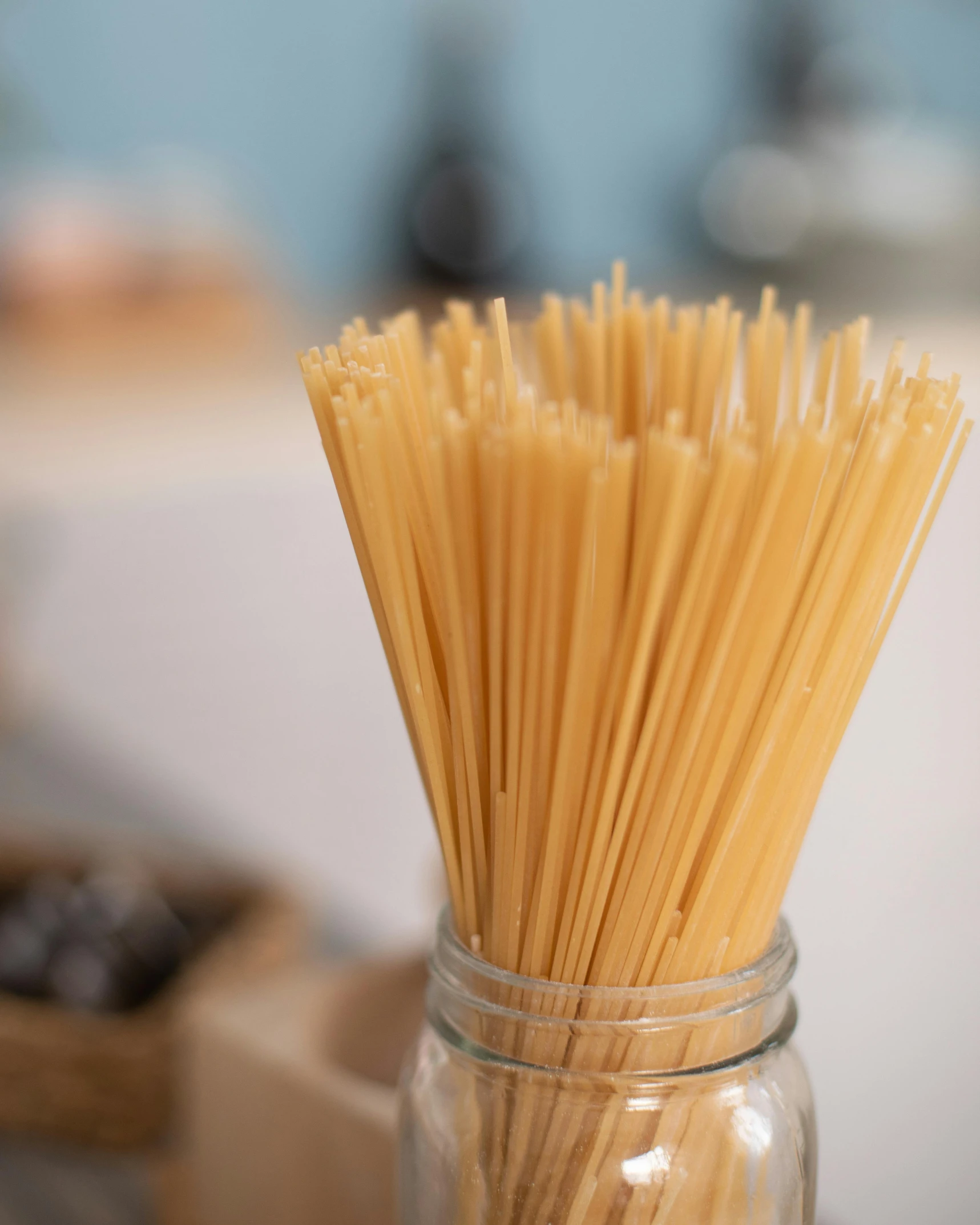 a close up po of a pasta dish in a jar