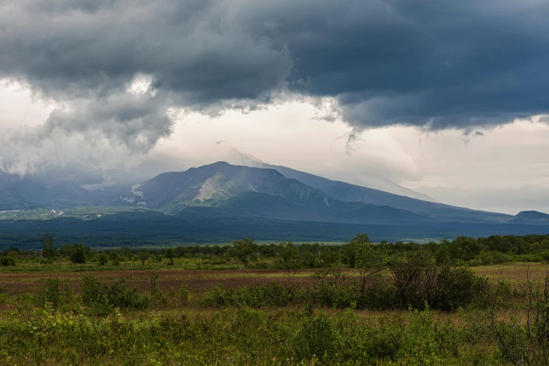 an image of a storm moving across the mountains