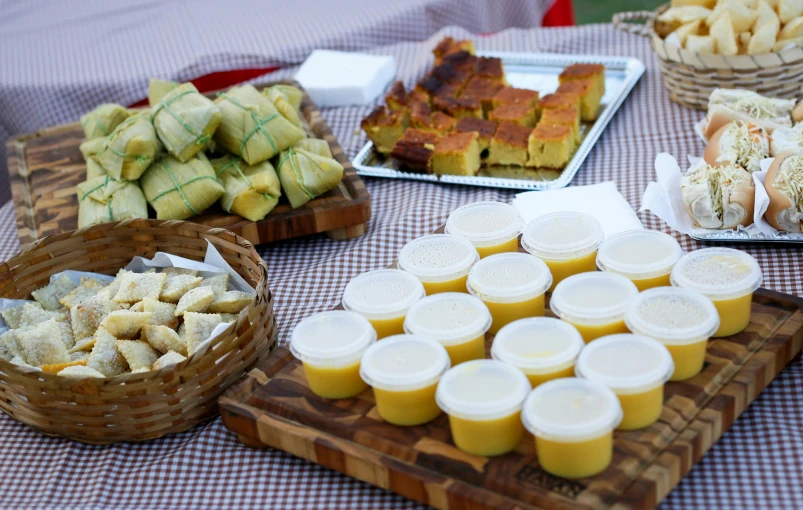 many different types of food are laid out on a table