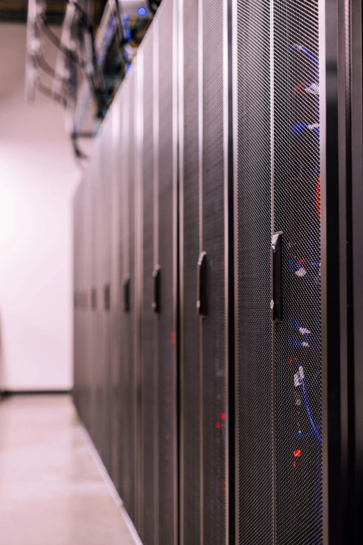 a big silver colored server in a large room