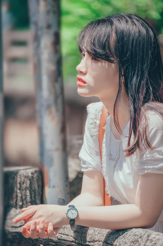 a young woman looking off into the distance