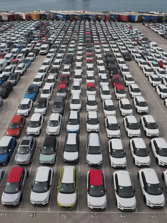 rows of cars parked next to each other