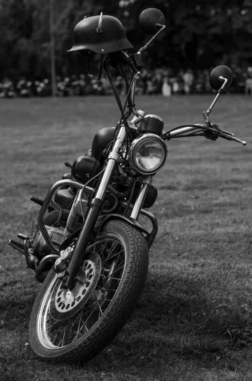 an old black and white po of a motorcycle