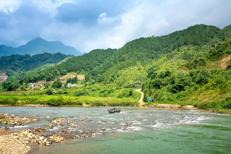 two boats in a small stream in the mountains