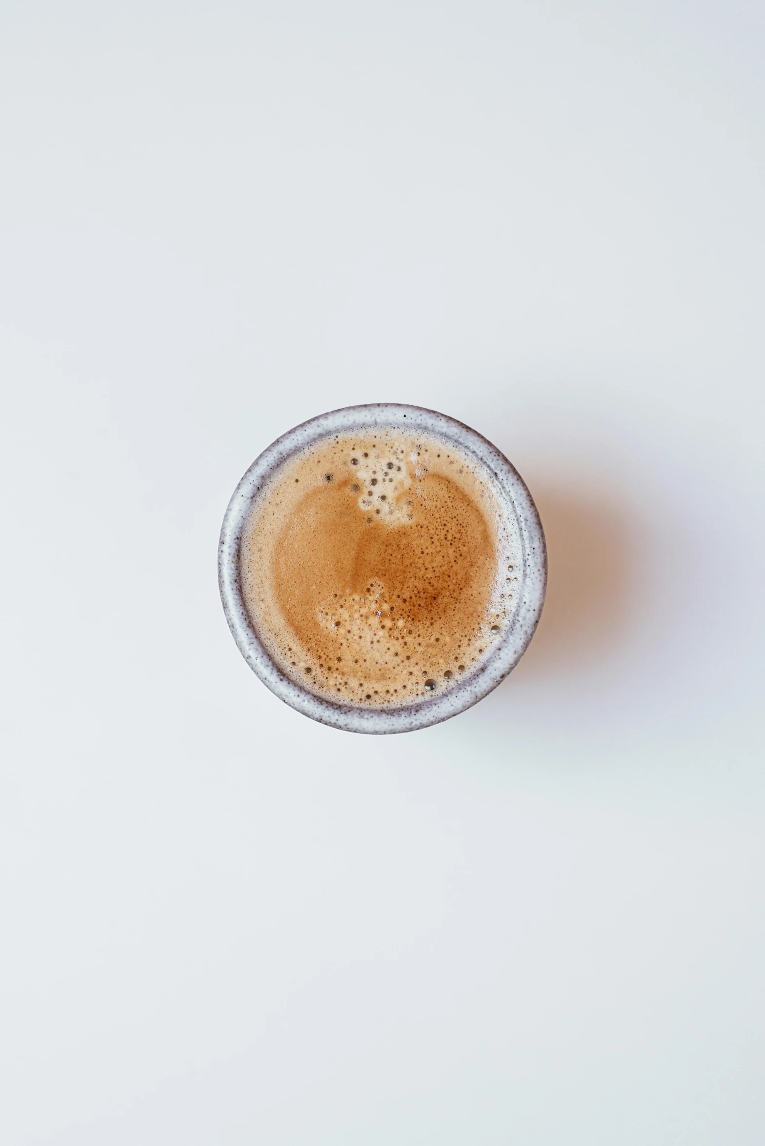 there is an image of a cup on the table