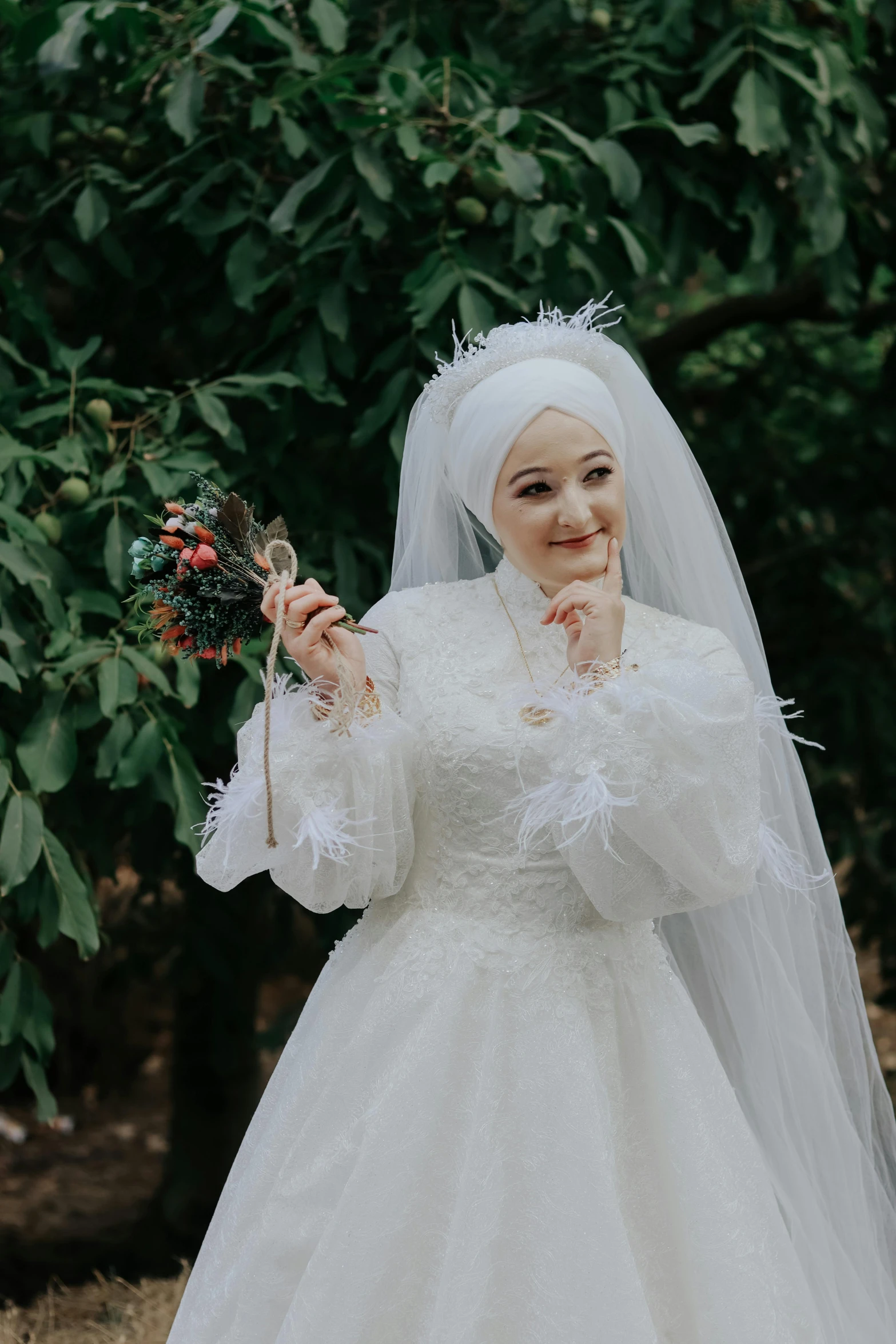 a bride in a white wedding dress with flowers