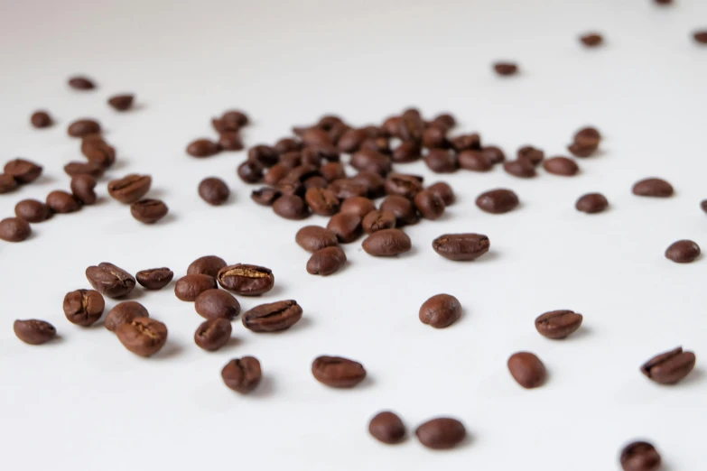 a close up of some nuts laying on a table