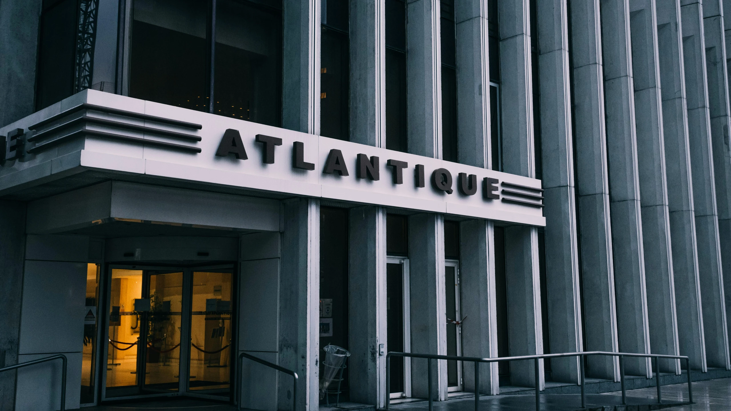 a black and white po with the entrance to a building