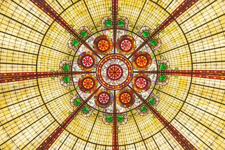 a mosaic - tiled ceiling shows different patterns, colors, and shapes