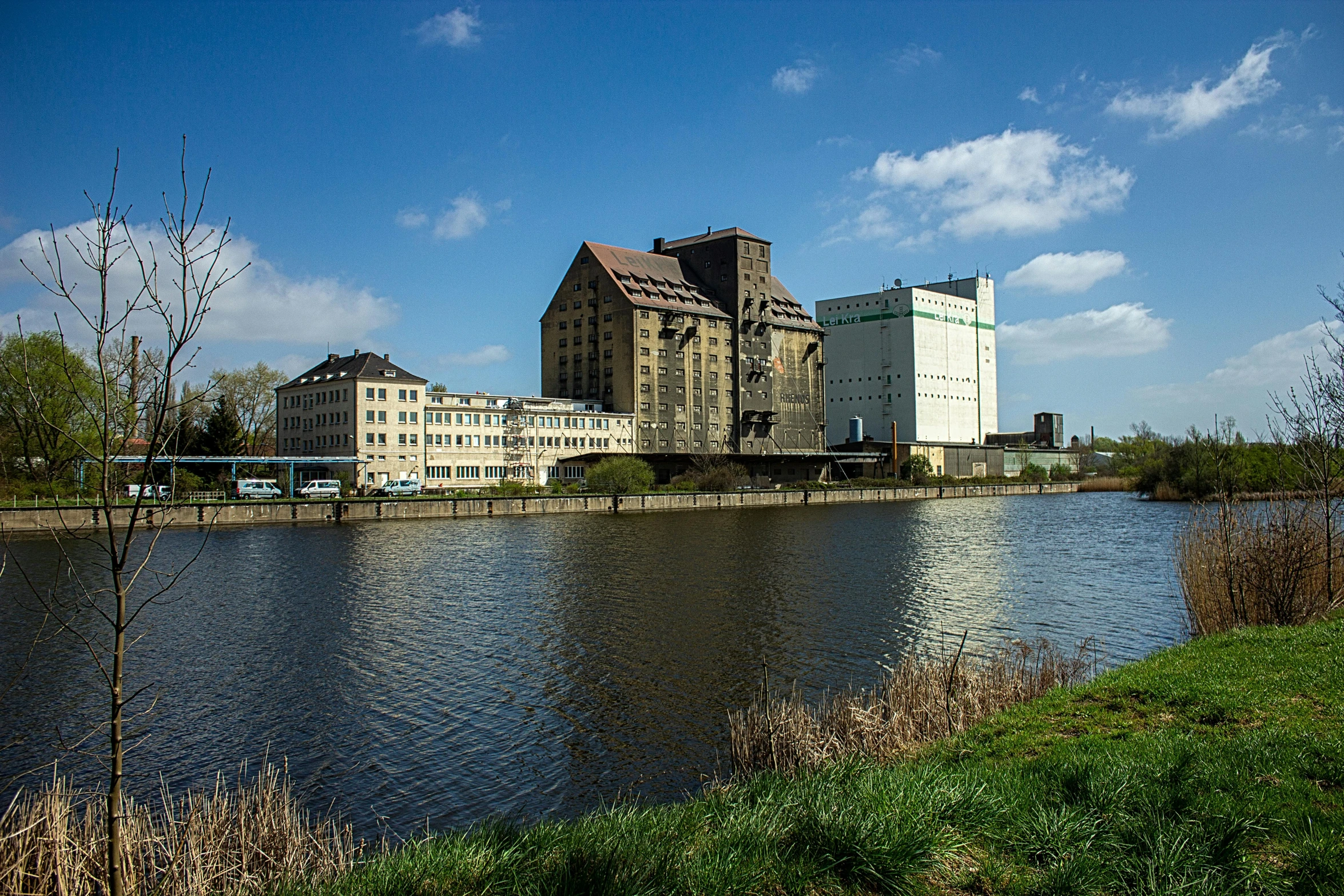 a big building by a body of water