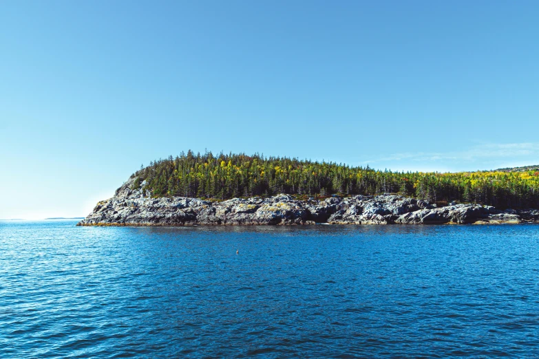 a small island in the middle of a lake