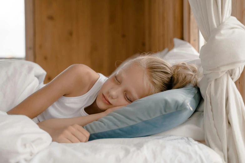 a  sleeping with pillows on a bed