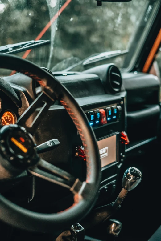 a steering wheel and dashboard of a car