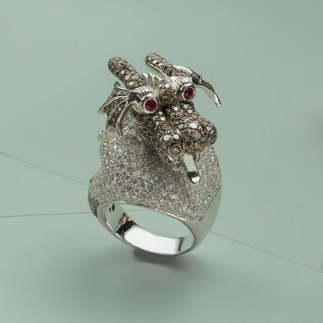 a ring with a dragon on top of it