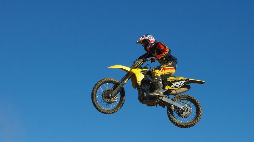 a person on a motorcycle jumping in the air