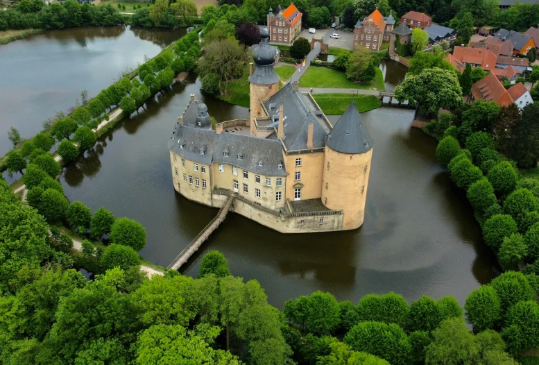 an aerial view of the chateau de cauveron