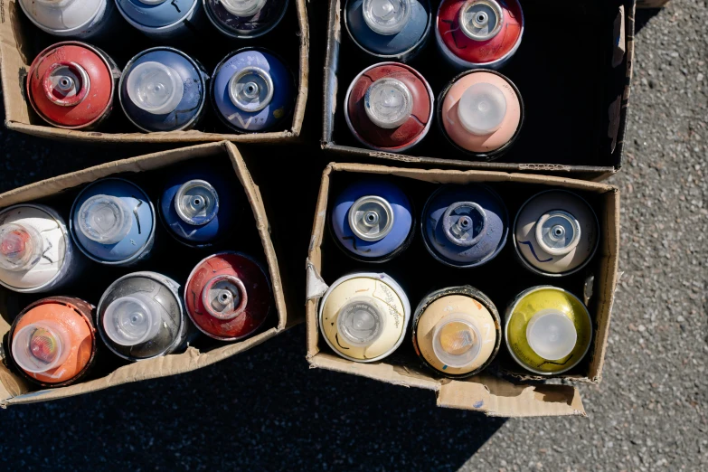 the cans are arranged neatly in a square box