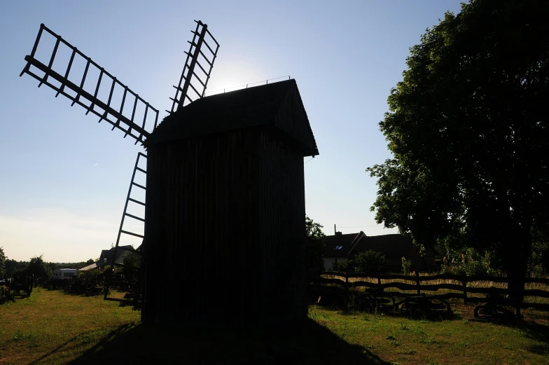 a large windmill with many blades on the front