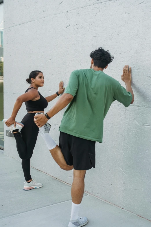 two people are in the middle of an energetic movement