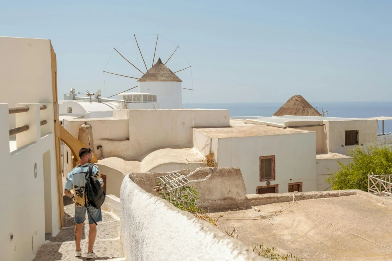 a person is on the steps of a small village