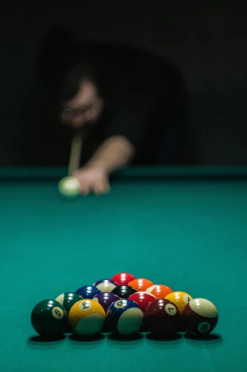 a pool table with a pool ball on it