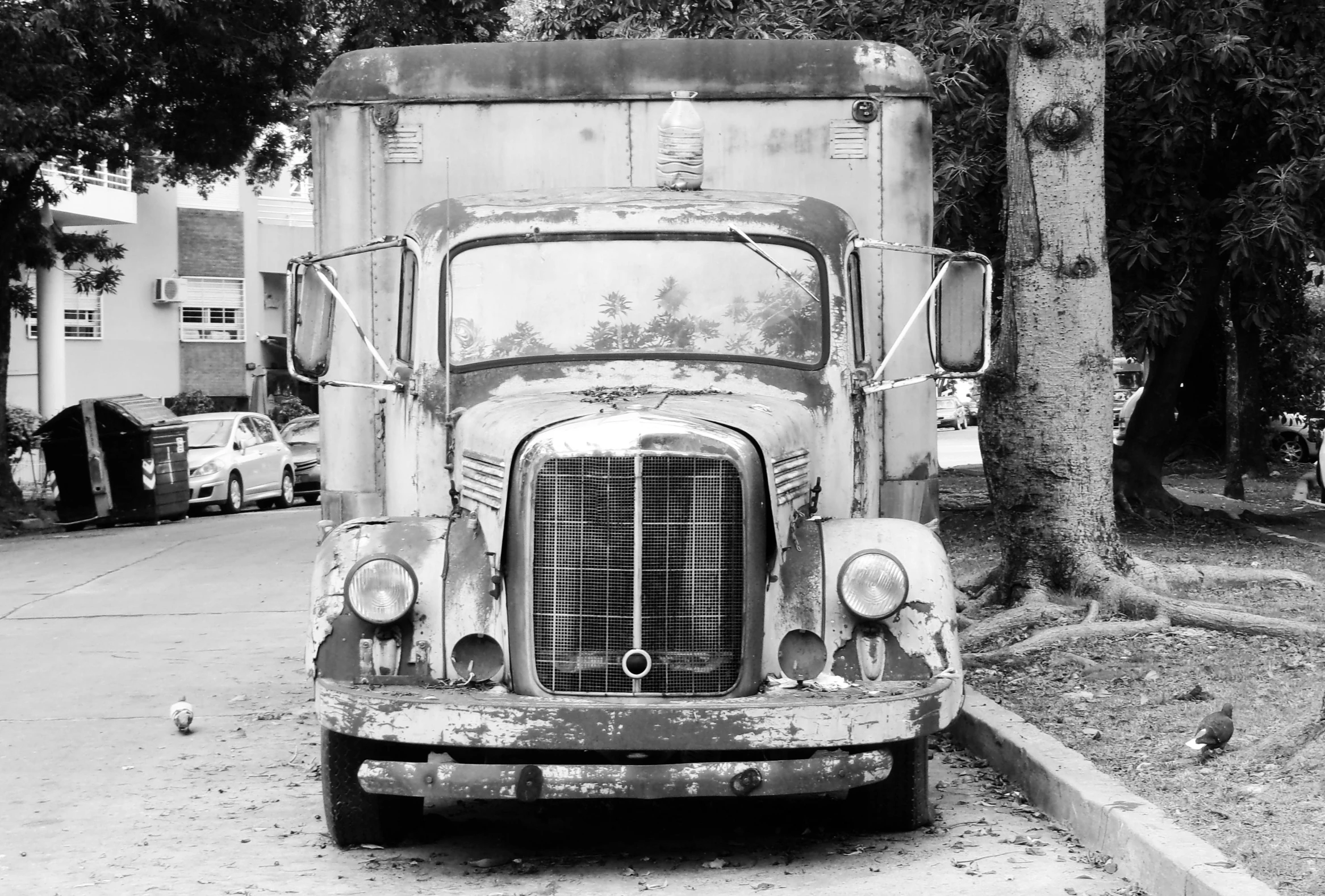 the old truck is painted to look like it has been rusted