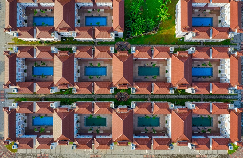 aerial view of several red rooftops next to each other