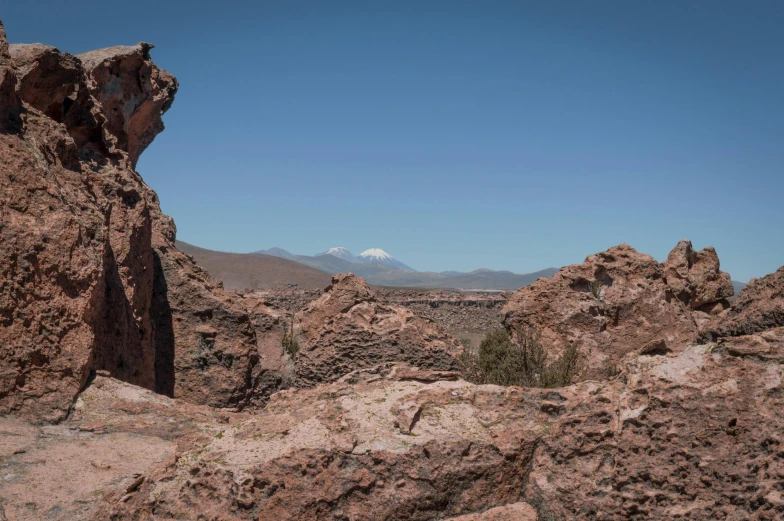 an image of mountains and rocks in the wild