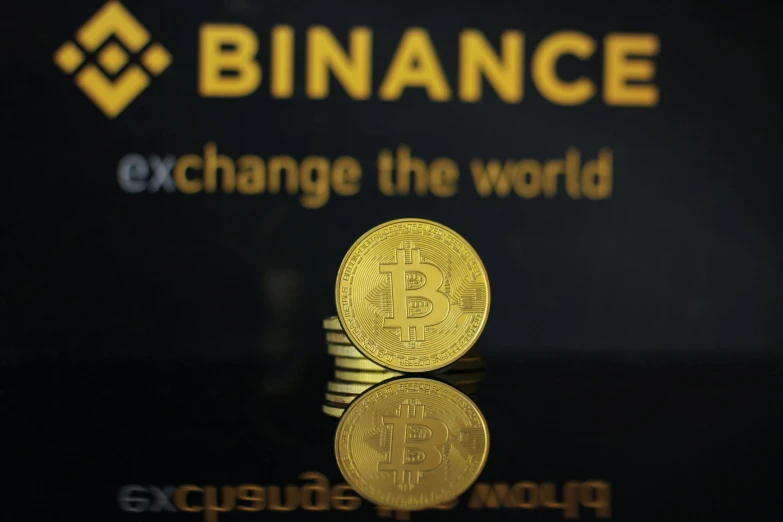 the currency in front of the exchange logo