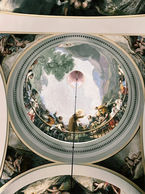 the ceiling is painted in a domed painting