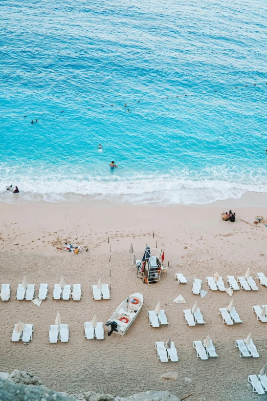 a view from the top of a hill looking down at the beach and ocean