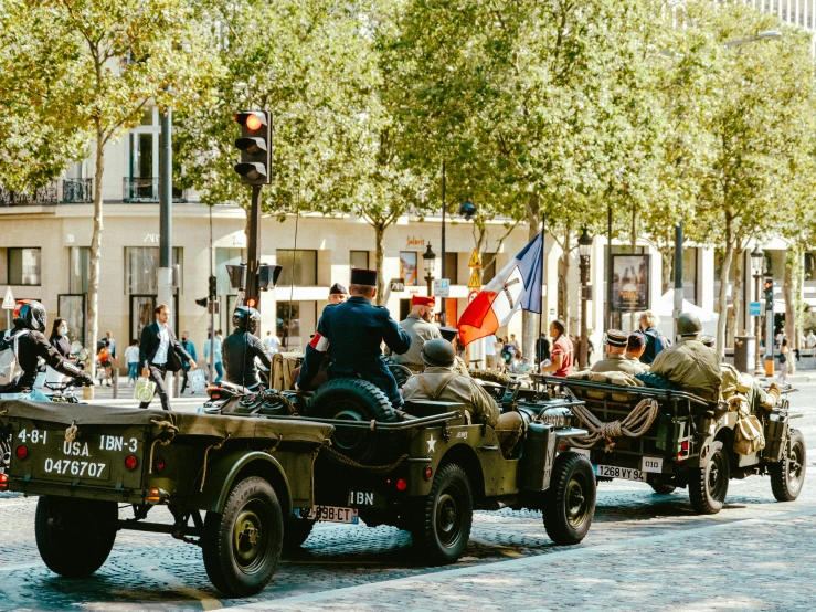 a line of motor cycles traveling down a street