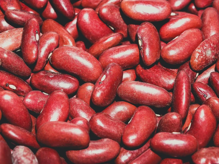 a pile of red beans on a table
