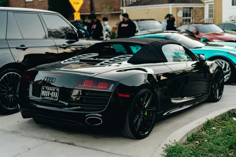 a black sports car with the hood up