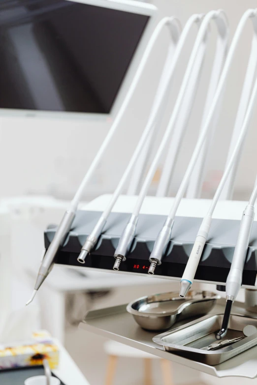 several dental instruments are sitting on a table