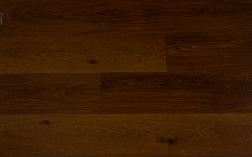 the top of an oak floor with some dirt on it