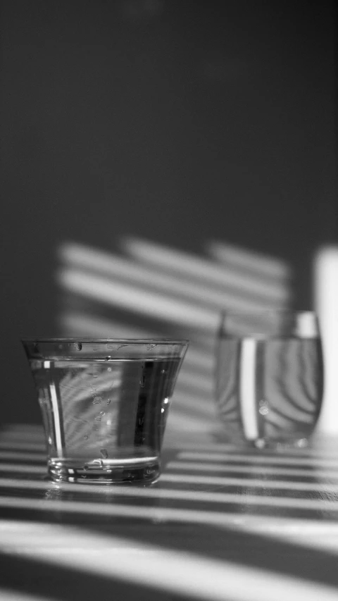 black and white pograph of a bowl on a table