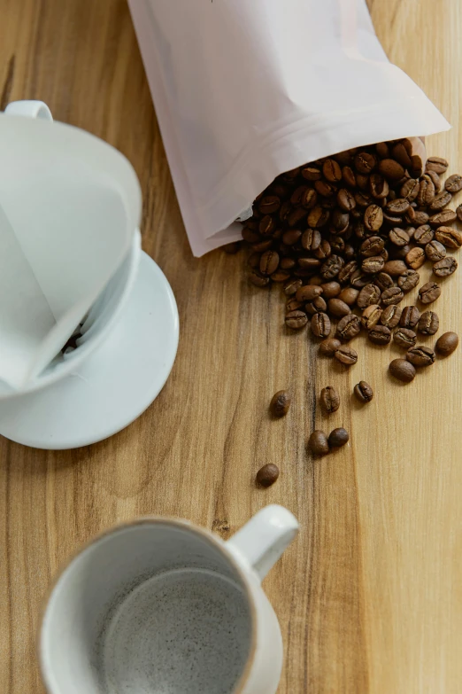 a close up view of some coffee beans on a table