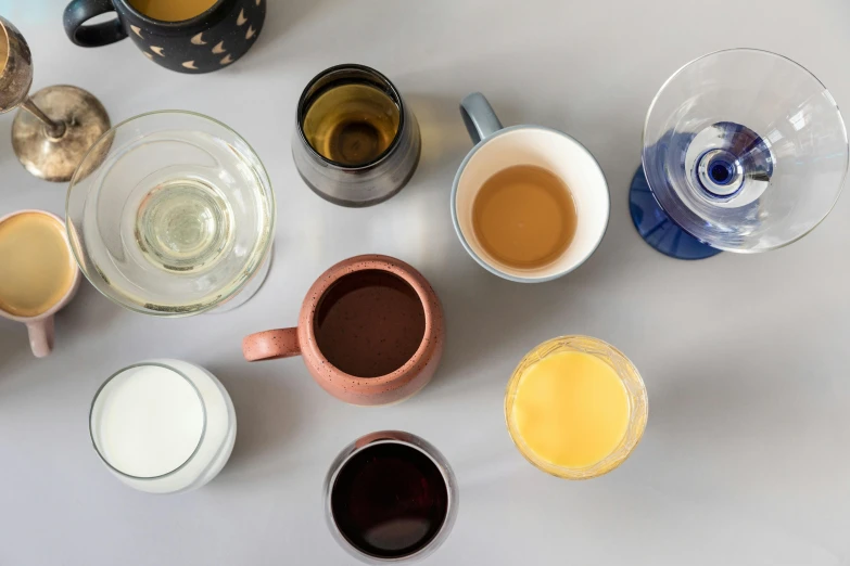 a table with several different types of coffee cups