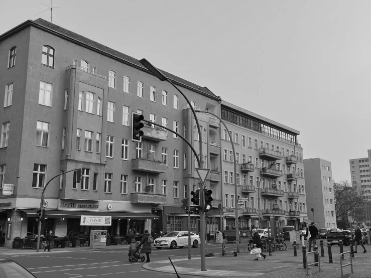 a street scene with a large tall building