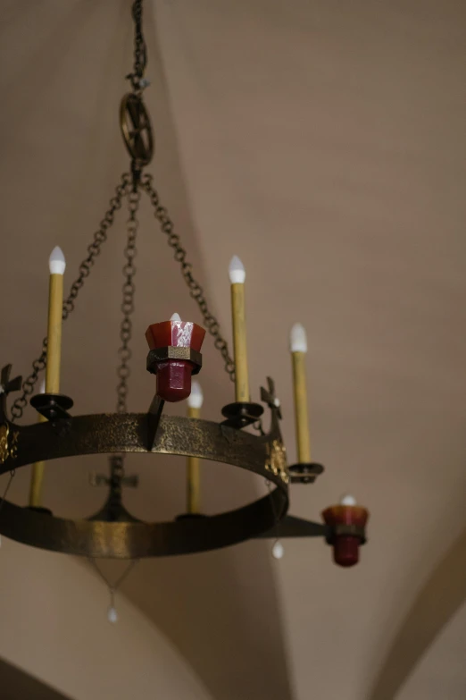 a large circular chandelier is attached to the ceiling