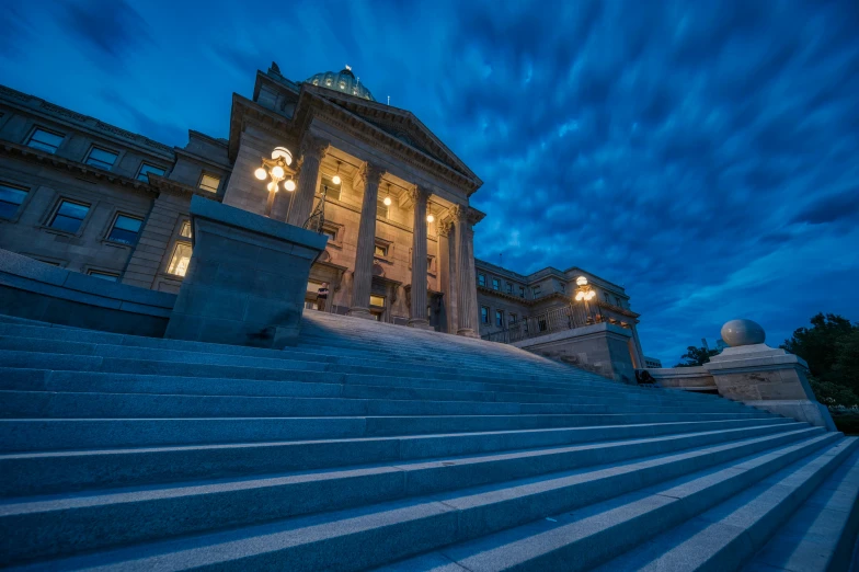 a big building that has some stairs in front of it