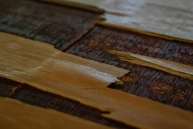 a close up of old worn wood planks