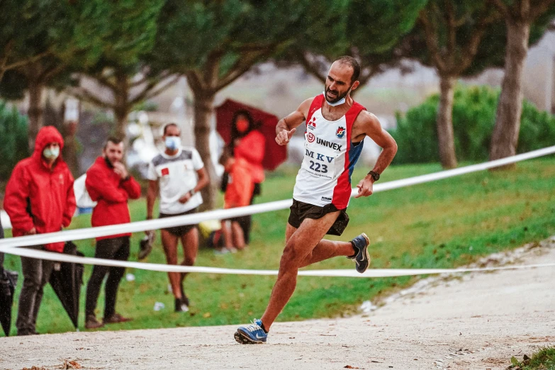 a cross country runner in the process of running