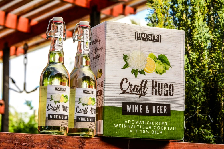 four bottle boxes of beer sitting on top of a table