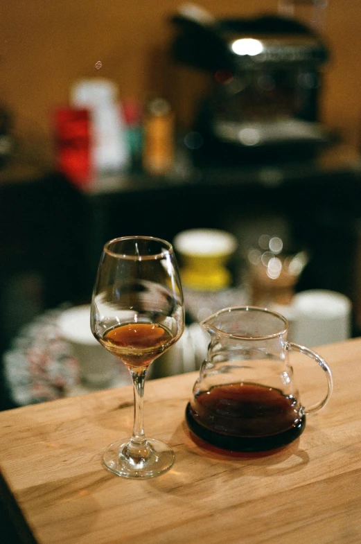 some wine glasses and a piece of wood